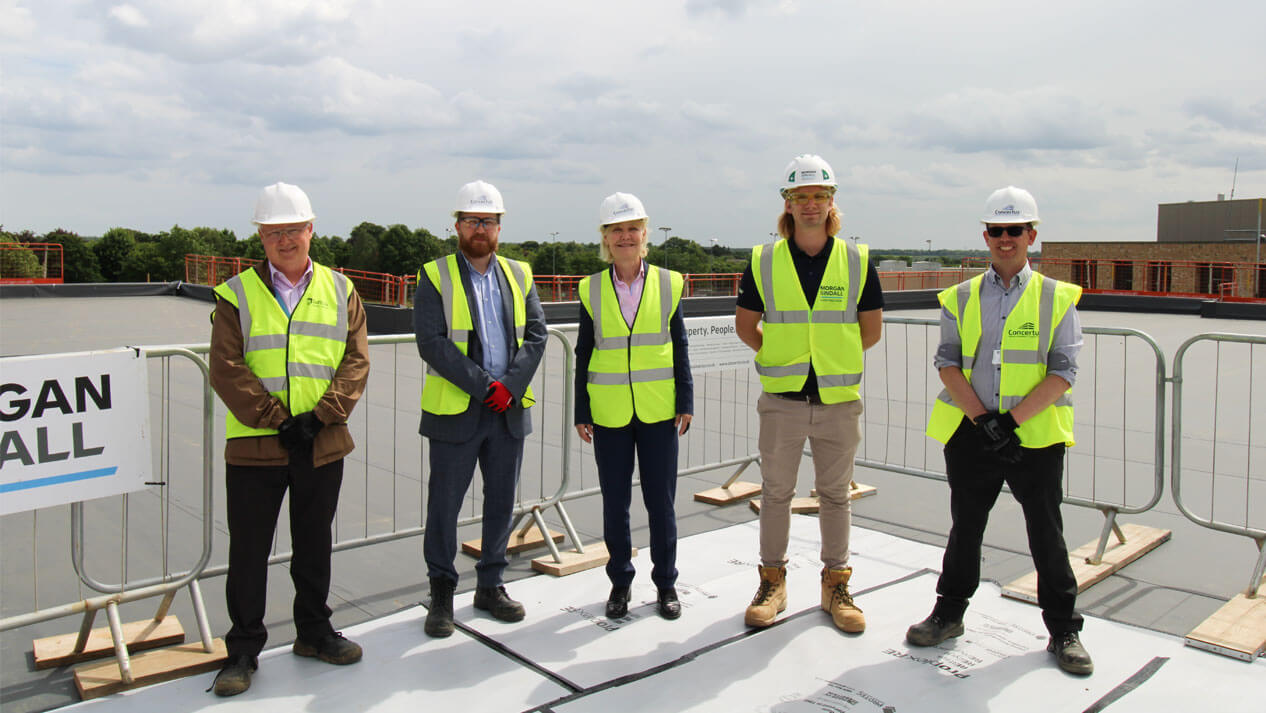 Staff and contractors on roof of Chantry Academy SEND unit